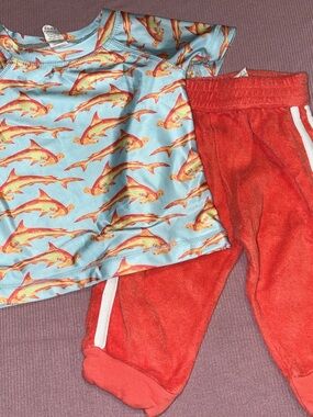 Kate Quinn rash guard and terry pants